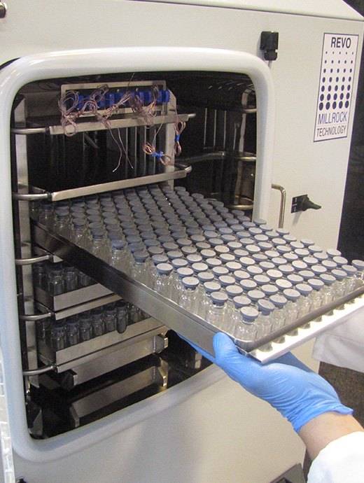 Loading tray of vials with removable bottom tray